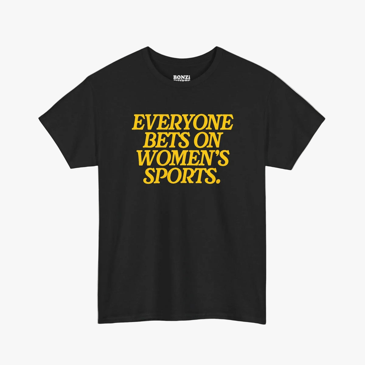 A black short-sleeve t-shirt with the phrase 'EVERYONE BETS ON WOMEN'S SPORTS.' printed in yellow across the chest, displayed on a clean white background.