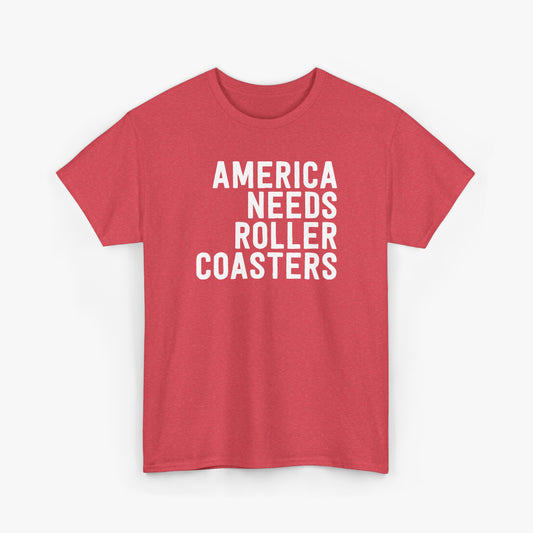 Heather red t-shirt with white text reading America Needs Roller Coasters, laid flat on a light gray background